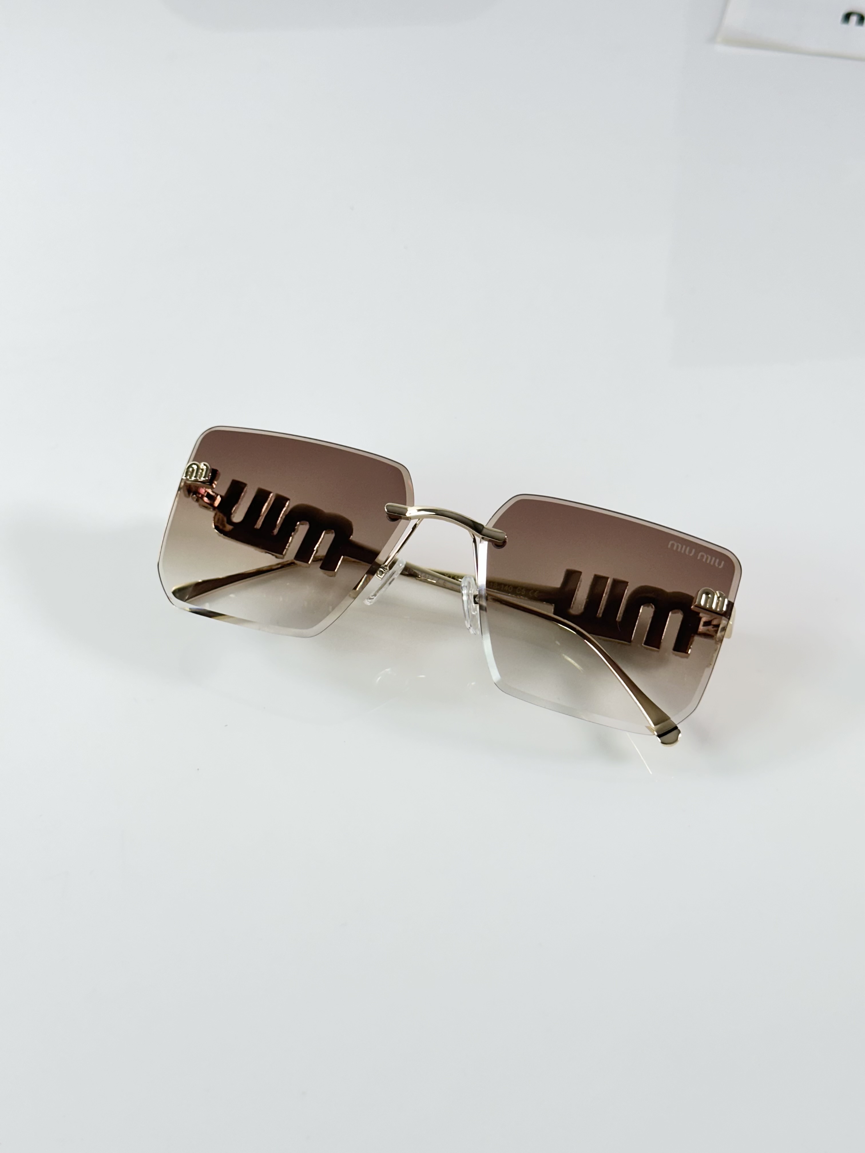 Miu Miu WMNS 1024 Gold Brown - Image 3