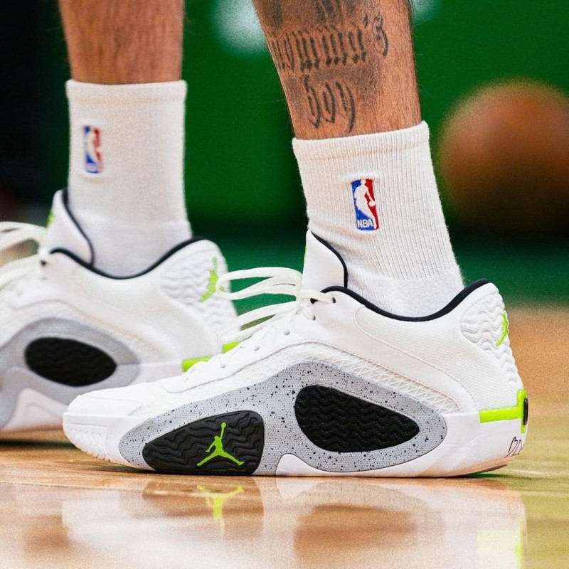 white and neon jordans