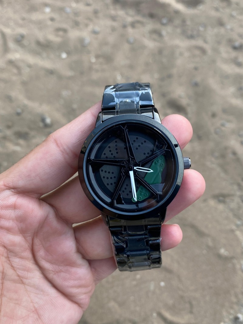 Fosil Spinner black green
