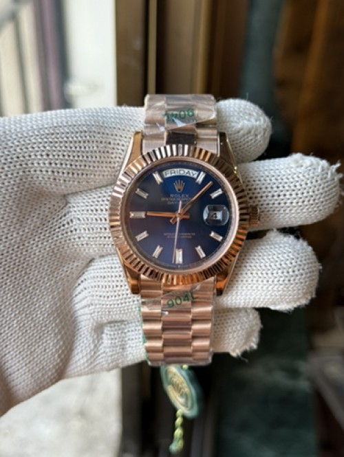 Rolexx Day Date Rose Gold Blue Baguette