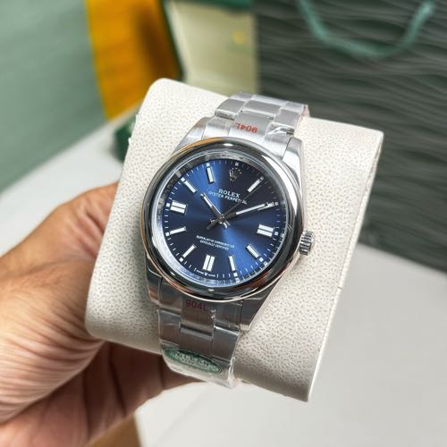 Rolex Oyster Perpetual 41MM Emerald Blue Dial
