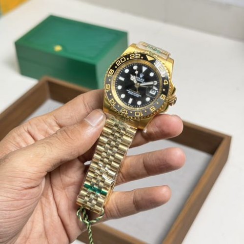 Rolex GMT Master II Yellow Gold Jubilee Strap
