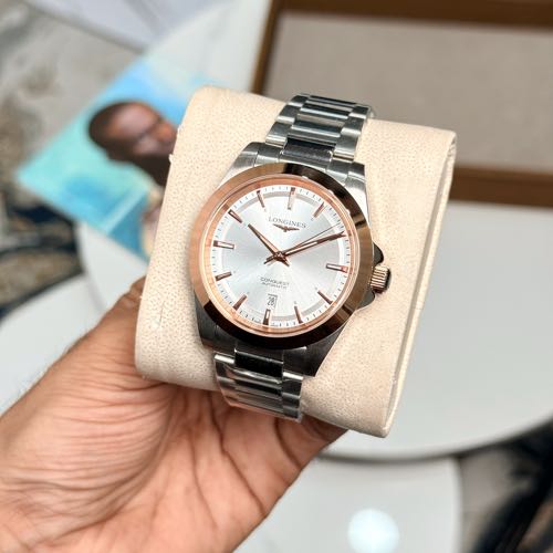 Longines Conquest Rosegold Bezel White Dial