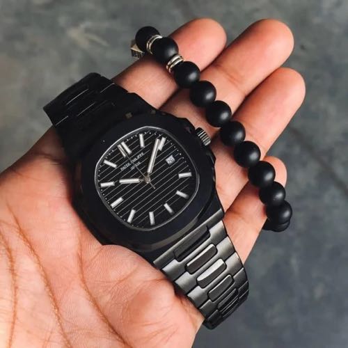 PATEK PHILIPPE NAUTILUS QUARTZ ( 050 )