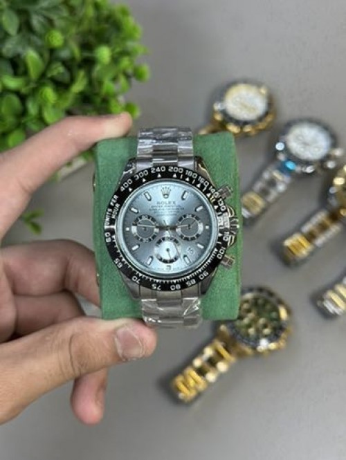 ROLEX DAYTONA SWIFT MOUMENT