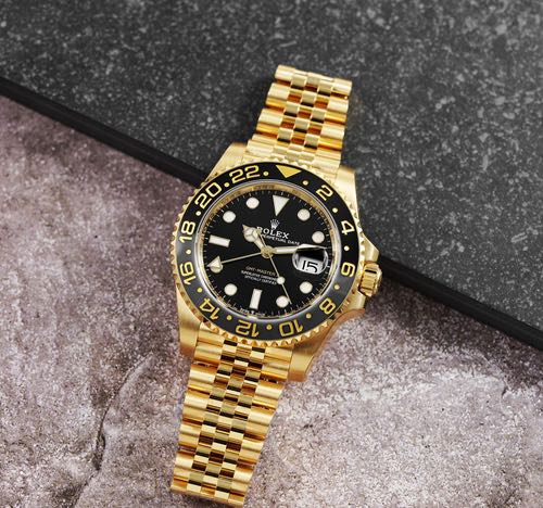 Alternative view of ROLEX GMT Master Yellow Gold Black Dial