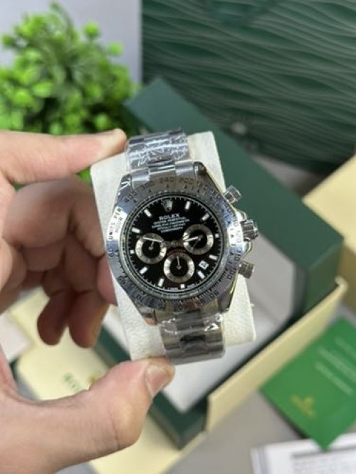 ROLEX DAYTONA SWIFT MOUMENT