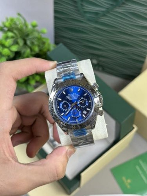 ROLEX DAYTONA SWIFT MOUMENT