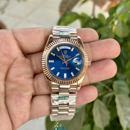 Rolexx Day Date Rose Gold Blue Baguette