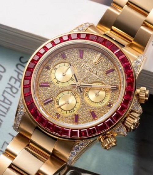 Rolex Daytona Yellow Gold Diamond Paved Dial Baguette Rubies