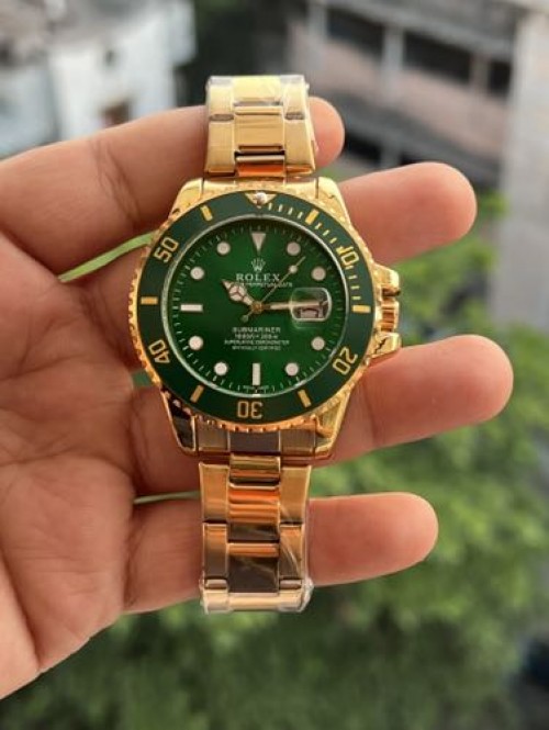 ROLEX SUBMARINER GOLD GREEN