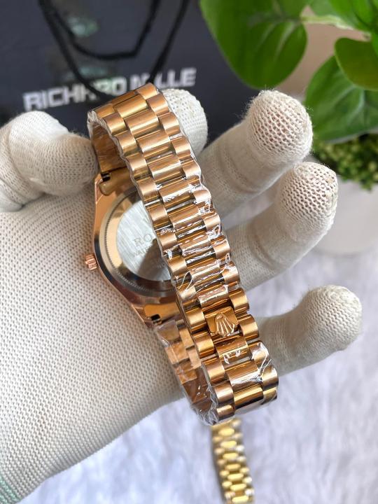 Role X DAYDATE ROSEGOLD GREEN ROMAN DIAL AT299