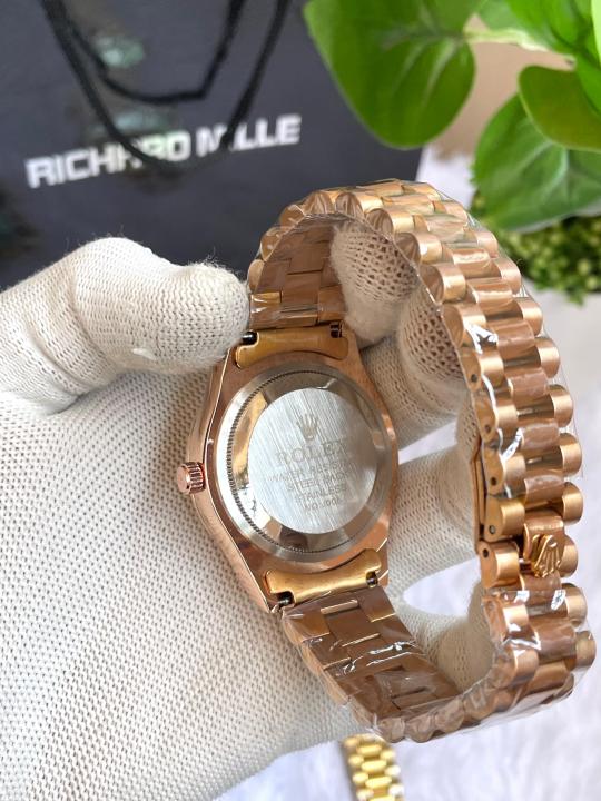 Role X DAYDATE ROSEGOLD GREEN ROMAN DIAL AT299