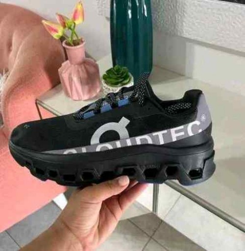ON Cloud monster running trainers in black and purple