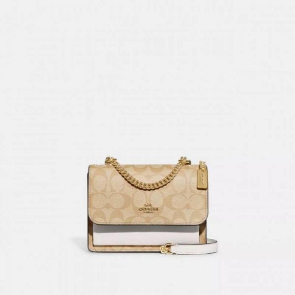 coatch Klare handbag Crossbody in Blocked Signature Canvas With folding 190