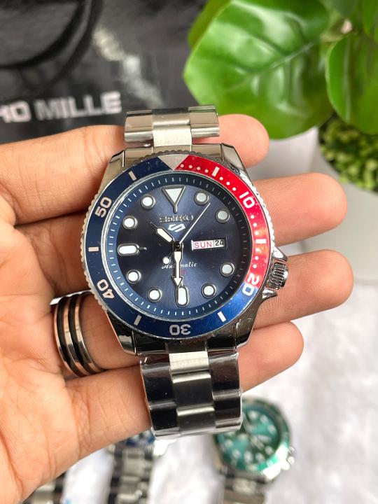Seiko 5 Sports Day Date Open Back Silver Red Blue AT458