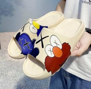 Yeezy boost caws slide