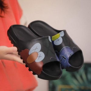 Yeezy boost caws slide