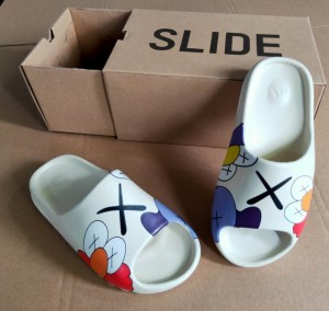 Yeezy boost caws slide