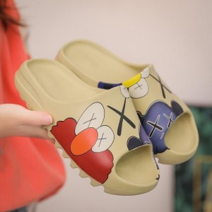 Yeezy boost caws slide