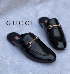 GUCCI BUCKLE MULES