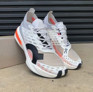 On Cloudboom Strike White Orange