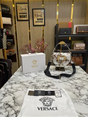 Versace shoulder bag in gold accents with magnetic closure bag (White and gold)