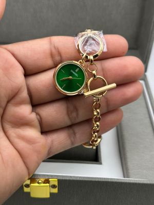 _Chanel_Gold_Green_Round_B6