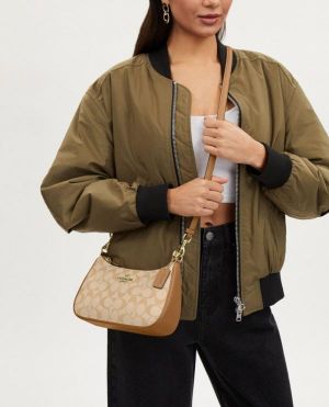 COAC_H Teri Shoulder Bag In Signature Canvas dual belts with og box  444