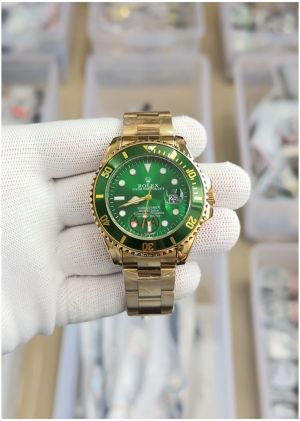 Role_x Oyster perpetual Submarine Gold-Green