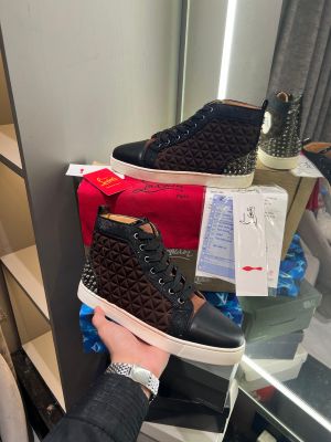  Chritiaan Louboutinn spikes brown heart
