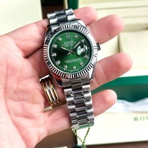Role_x oyster perpetual date just silver green
