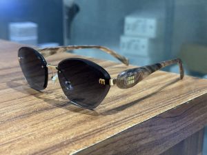 Miu Miu Brown-Black Luxury Shade 49