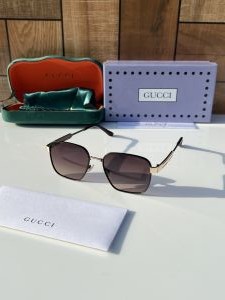 Gucci_526_gold_brown
