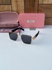 Miu miu 720 gold black Miu miu 720 gold black