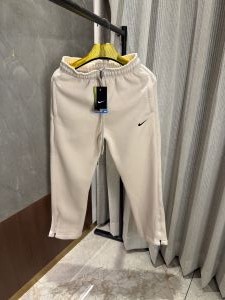 Nik e Beige Track pants with Bottom Zip