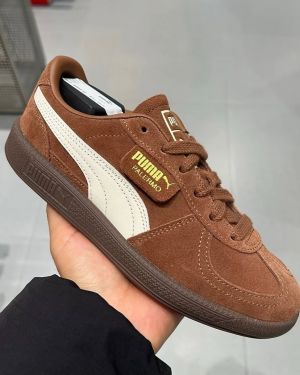 Pumma Palermo sneaker in a brown suede and warm white colorway.