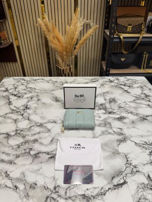 Coac_h Quilted Zipper Wallet Includes Box and Dust Bag (CXD005-Light Blue)