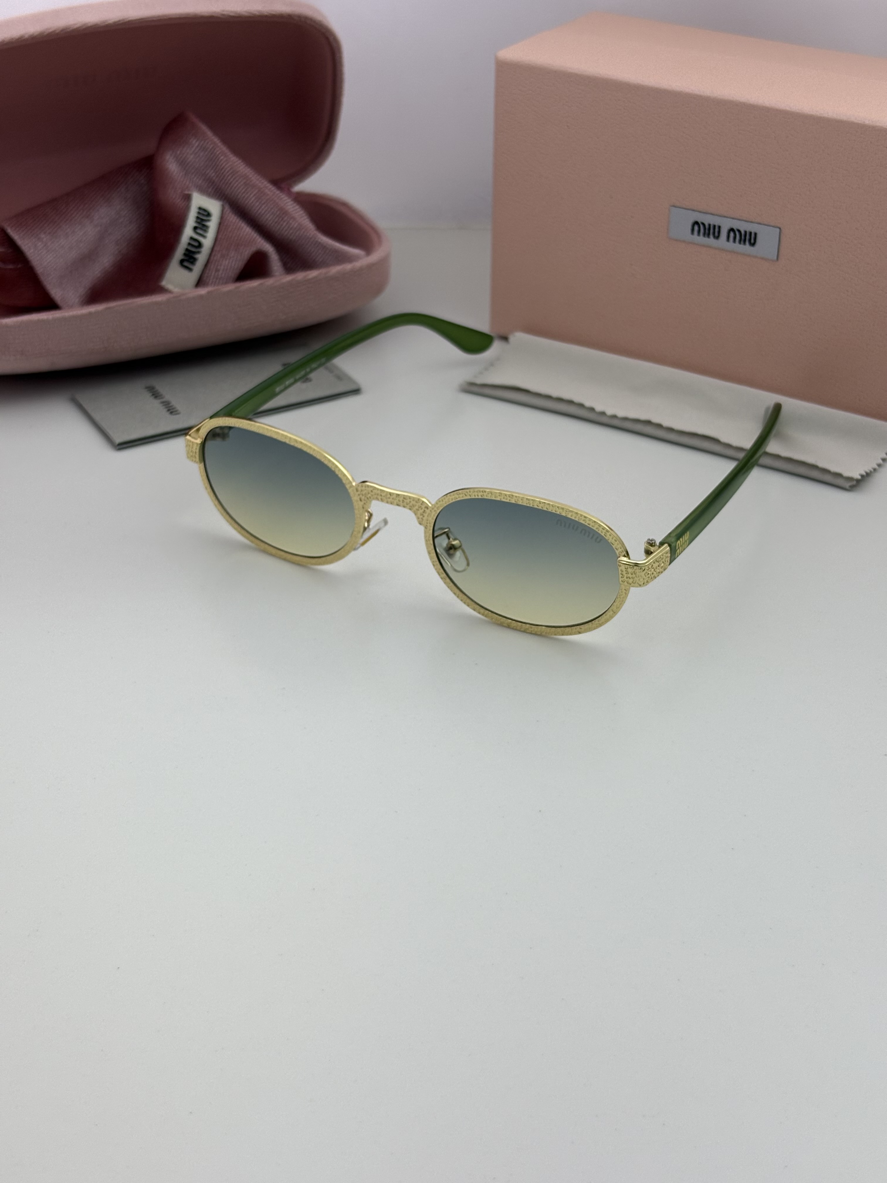 Miu.miu 90 Golden sea green 