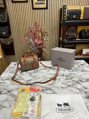 COAC_H NOLITA CANVAS SLING BAG WITH BOX AND DUST BAG (BROWN)