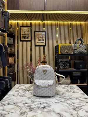 GUESS WOMENS BRAND LOGO BAGPACK WITH DUST BAG AND POUCH (WHITE)