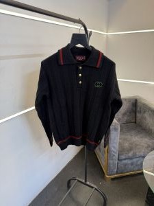 Gucc i black knitted imported sweatshirt with brand button and logo on chest 
