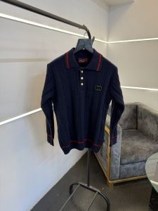 Gucc i navy blue knitted imported sweatshirt with brand button and logo on chest 