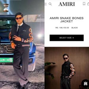 Amir i black snake bone imported varsity jacket with brand snap button as per store
