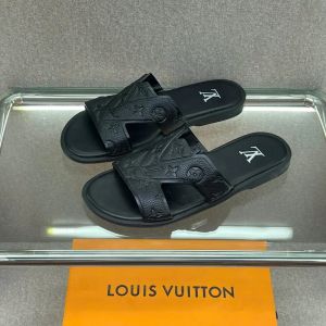 LOUIS VUITTO.N LV Oasis Mules in black grained calf leather embossed with the Monogram pattern