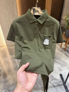 Arman i exchange Green Polo Tshirt Pocket brand logo