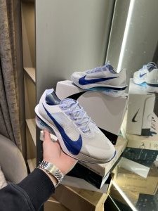 Nik e Vaporfly 4 Road Racing White Blue