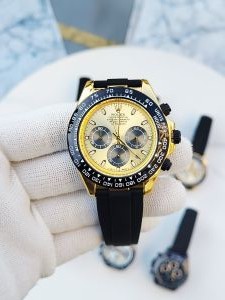 ROLEX_DAYTONA_BLACK_GOLD_DIAL_AT342