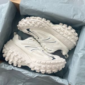 Balenciaga Defender Bouncer Sneakers in white fixed