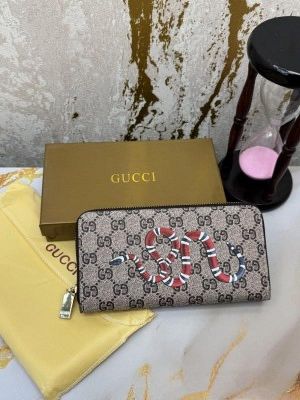 GUCC_I LONG ZIP AROUND WALLET WITH OG BOX AND DUST BAG (APRICOT SNAKE) 60017